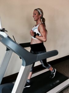 Meredith Kessler running on treadmill baby bump